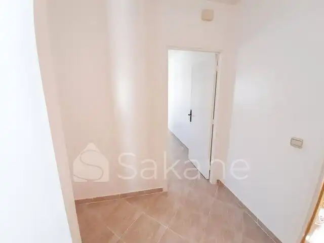 Appartement Moyen standing situé à Résidence Mouna ,Quartier nassim - 7/9
