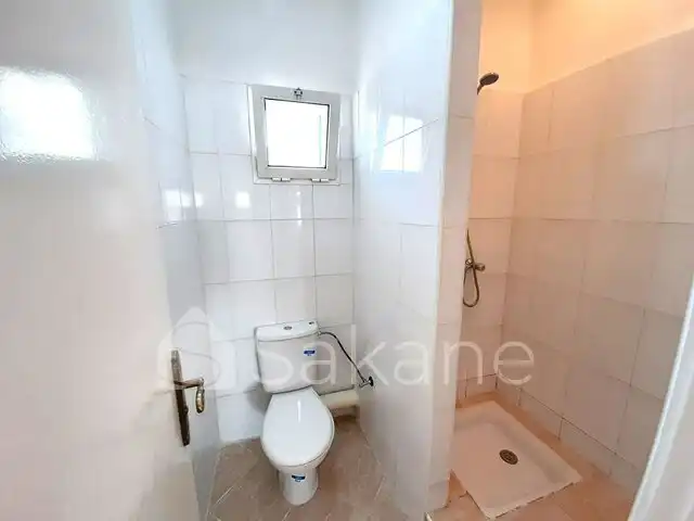 Appartement Moyen standing situé à Résidence Mouna ,Quartier nassim - 8/9